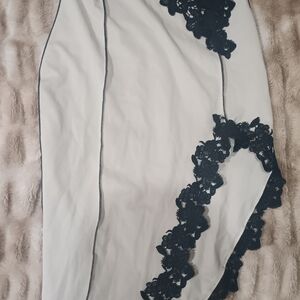 Chic White Chemise with Black Lace Accents